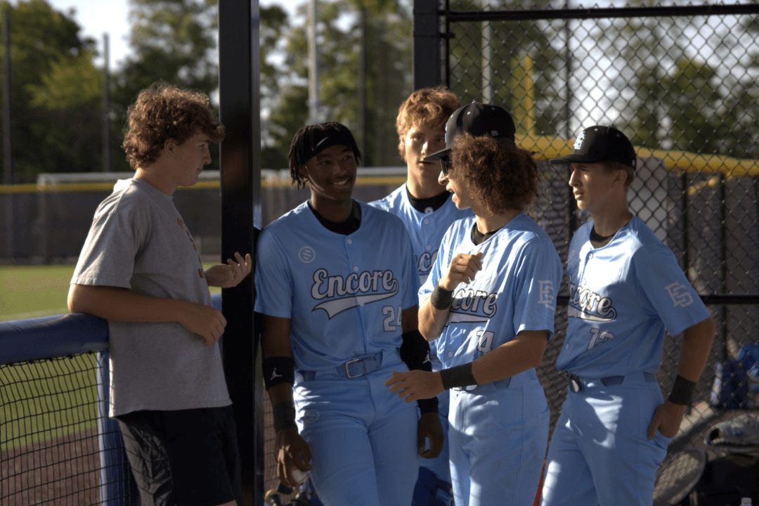 16u team huddle on the mound